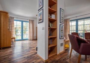 Semi-detached house with a sauna, garden, and heated pool in the Freesenbruch vacation park in Zingst