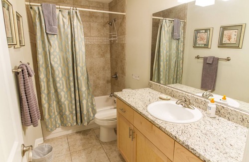 Butler Beach House | Pet-Friendly Duplex , Two Blocks from The Beach with Ocean Views