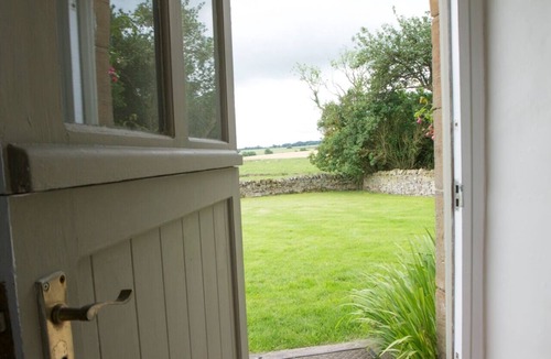 Hallington Cottage | Stone Built Cottage with Large Enclosed Garden & Private Lake Area
