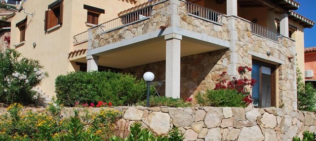Bouganville apartment on villa with garden facing Tavolara Island in Porto San Paolo