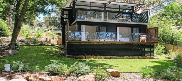 Elegant abode only moments to Macmasters Beach in MACMASTERS BEACH