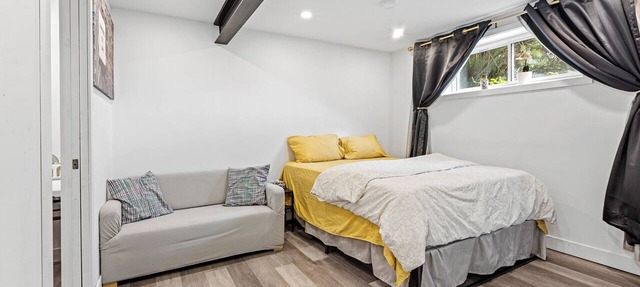 Exquisite Black & White Apartment with Unparalleled Charm in Gatineau