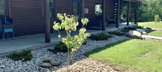 Hocking Hills log cabin with guest house on 12 private acres with pond in Logan