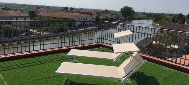 Palazzo Spada - App. Flamingo penthouse with terrace overlooking the Po River in Codigoro