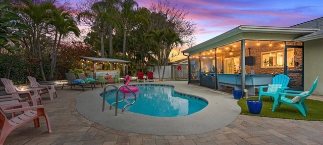 Private Palm Harbor Home H/Pool, Hot Tub, Tiki Bar, Putting Green and More! in Palm Harbor