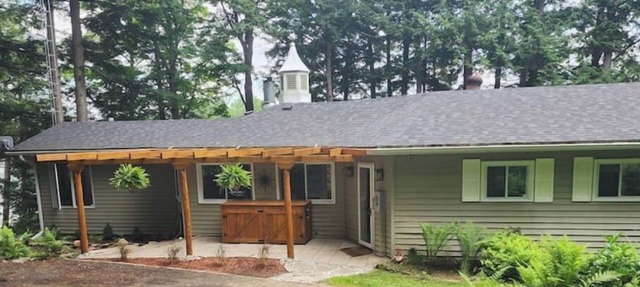 Spacious, waterfront home surrounded by trees with large dock & games room. in Haliburton