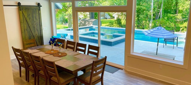 Custom Luxury Home! Huge heated pool, hot tub, all sports lake, min to Saugatuck in Fennville